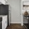 a kitchen with white cabinets